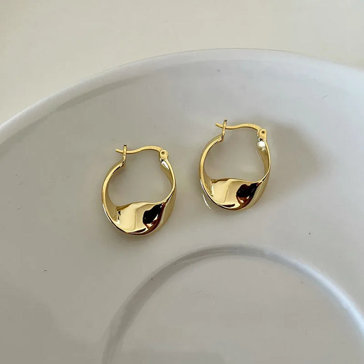 Skanto | Minimal Flattened Irregular Hoop Earrings