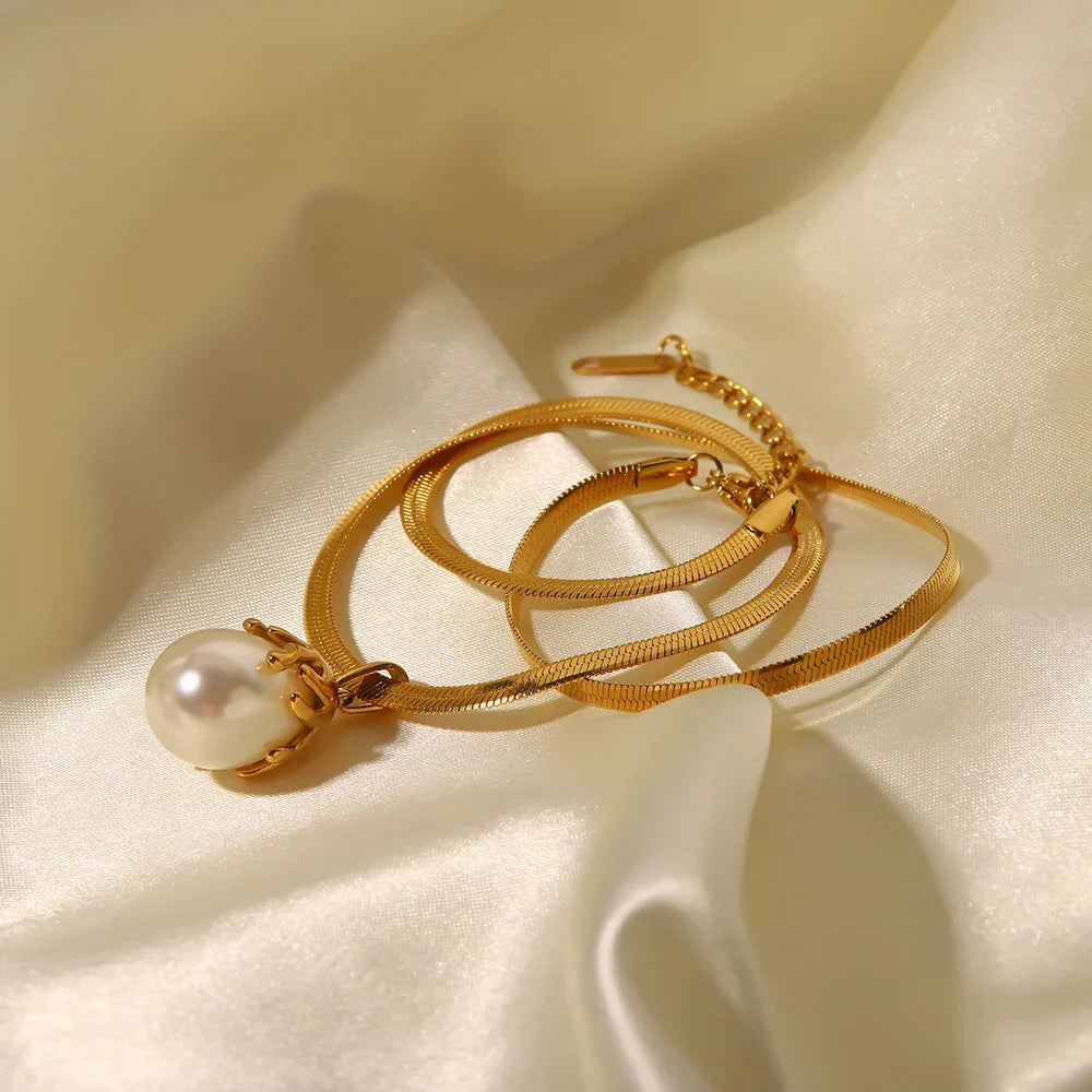 Skanto | 18k Blooming Pearl Smykke og Øredobber