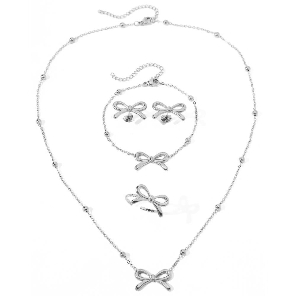 Skanto | Feminine Bow Satellite Chain Necklace, Bracelet, Earrings, and Ring Set