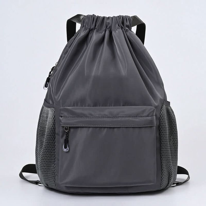 Skanto | Sporty Drawstring Ryggsekk med Skoparti & Lommer