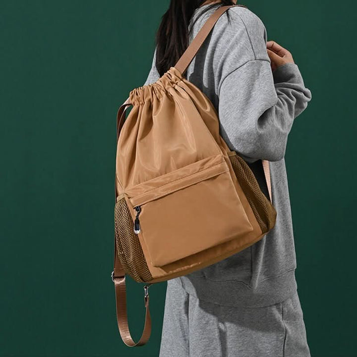 Skanto | Sporty Drawstring Ryggsekk med Skoparti & Lommer