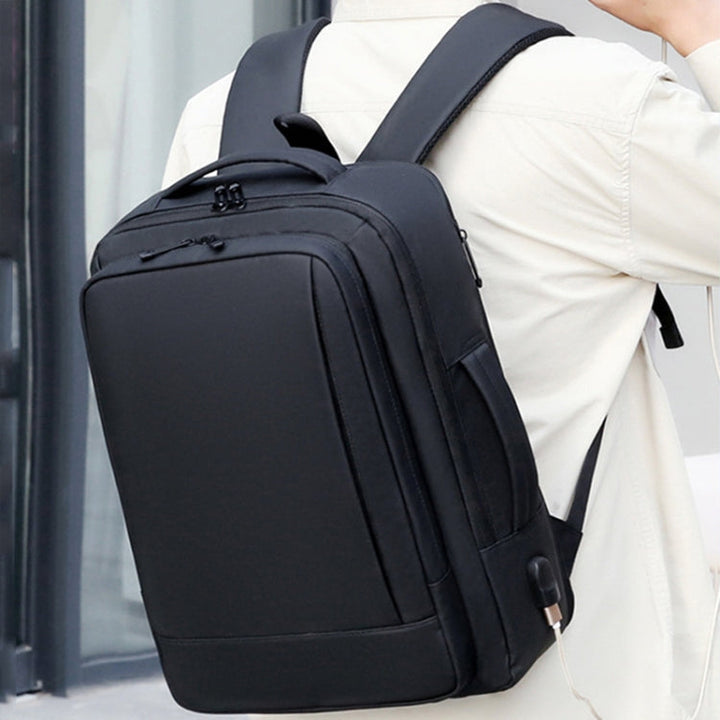 Skanto | Utvidbar vanntett laptopryggsekk for jobb med USB-port (Svart)