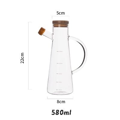 Transparent glassolje flaske med håndtak | Skanto