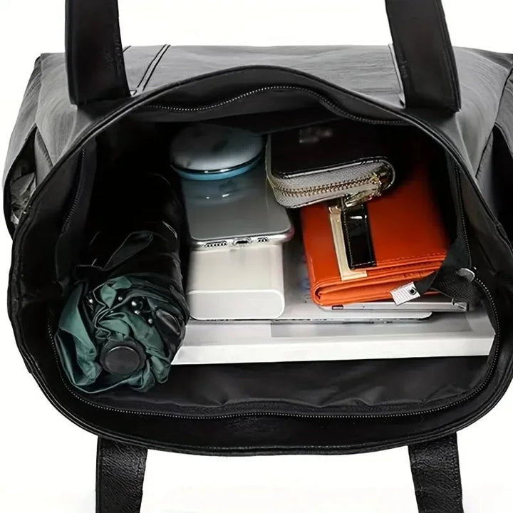 Elegante Schultertasche aus Leder im Retro-Stil mit glatter Oberfläche