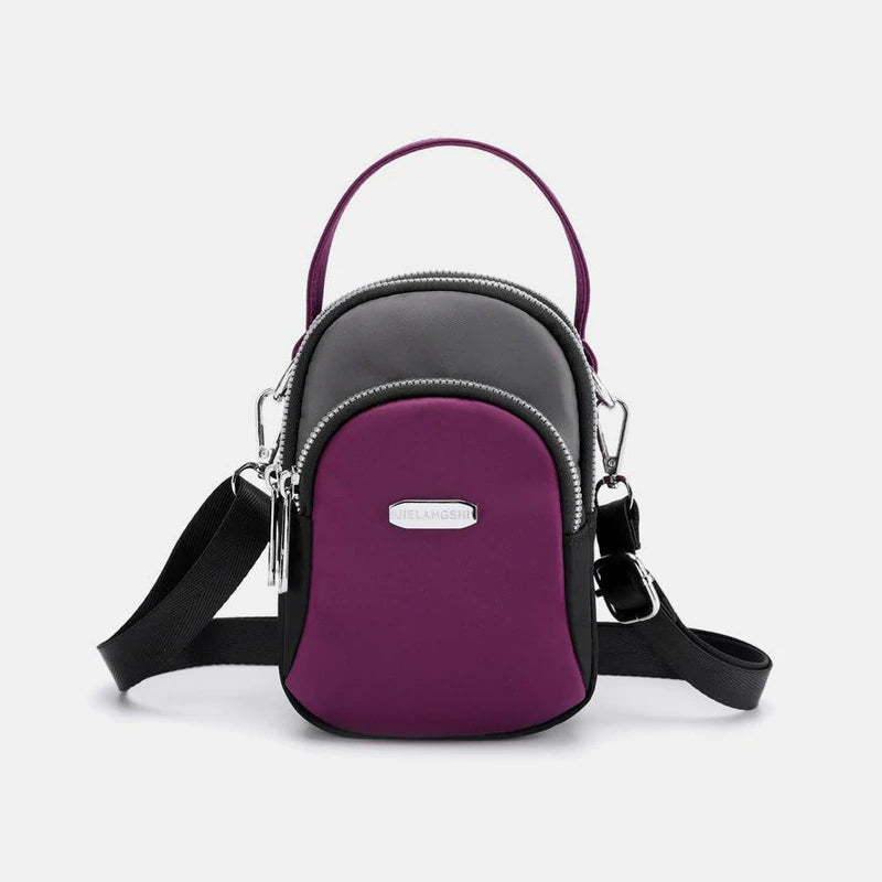 Vanntett liten skulderveske laget av nylon | Skanto