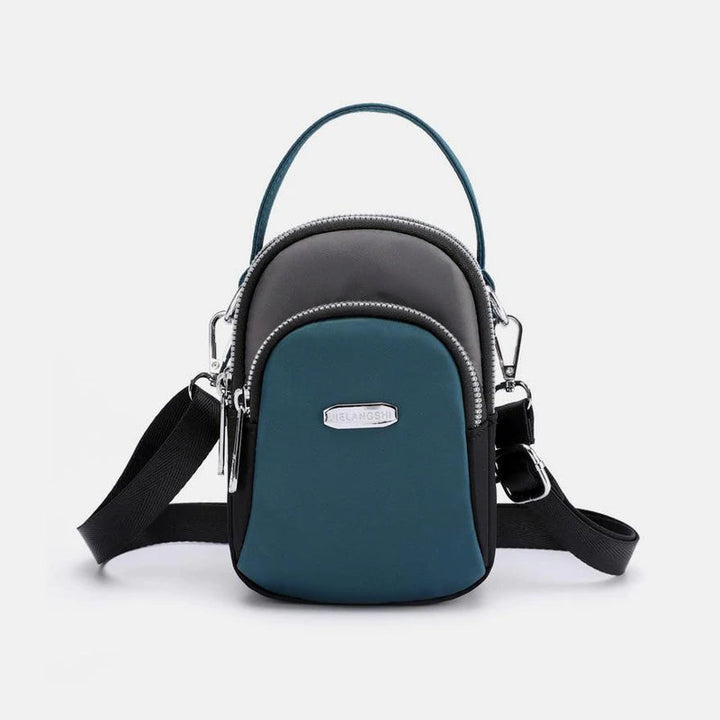 Vanntett liten skulderveske laget av nylon | Skanto
