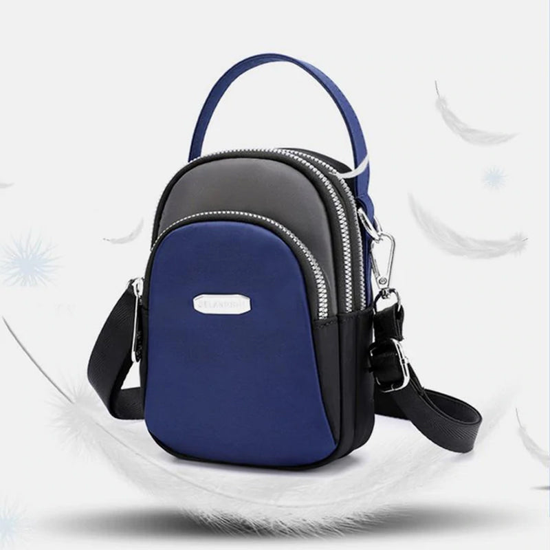 Vanntett liten skulderveske laget av nylon | Skanto