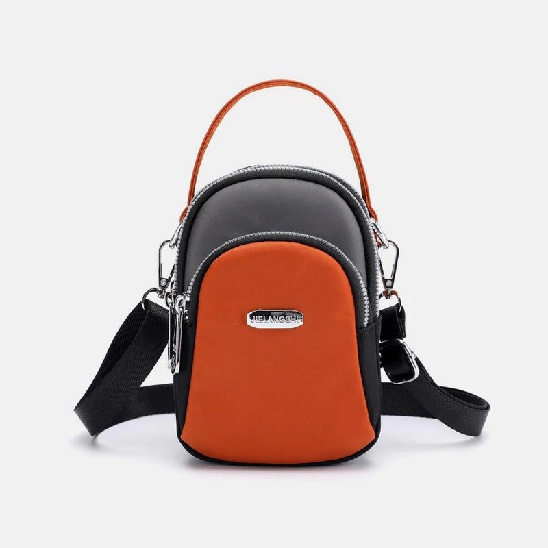 Vanntett liten skulderveske laget av nylon | Skanto
