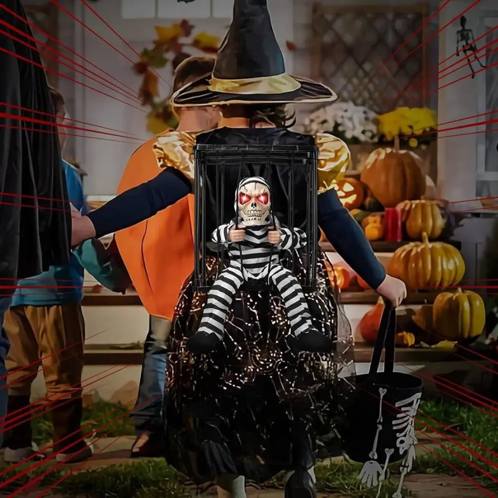 Skanto | Halloween-dekorasjon – Bevegelig fange i bur med lyd- og bevegelsessensor