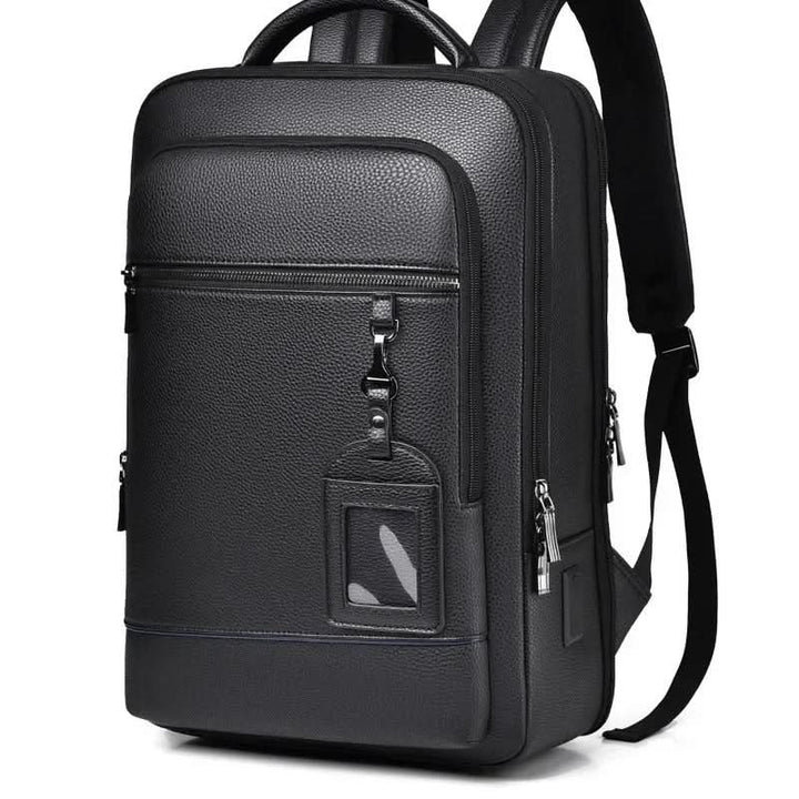 Skanto | Elegant lær ryggsekk for menn/kvinner med USB-port for laptop og hverdagsbruk, 15,6 tommer, svart