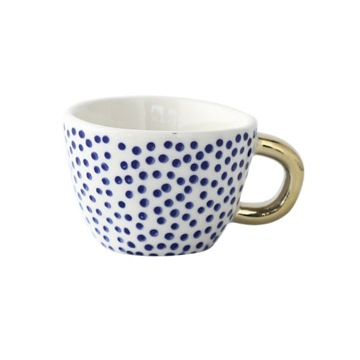 Skanto | Cup med abstrakt geometrisk mønster og gullhåndtak