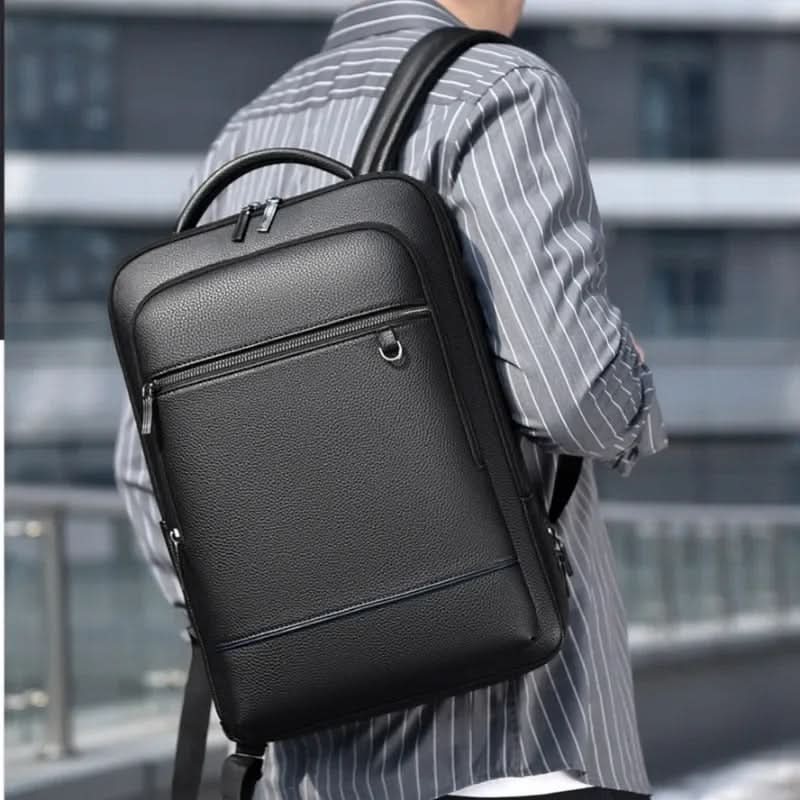 Eleganter Lederrucksack for Damen og Herren med USB-anschluss for laptop og täglichen bruk, 15,6 Zoll, schwarz