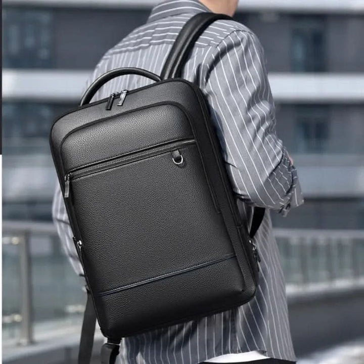 Eleganter Lederrucksack for Damen og Herren med USB-anschluss for laptop og täglichen bruk, 15,6 Zoll, schwarz