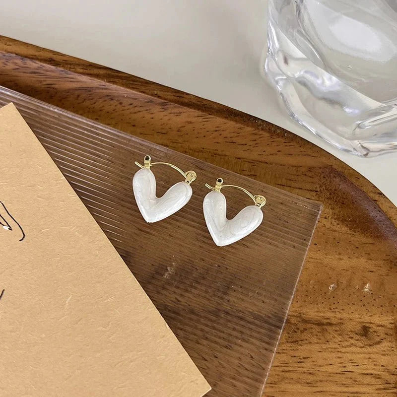 Skanto | Elegante emalje hjerteøreringer