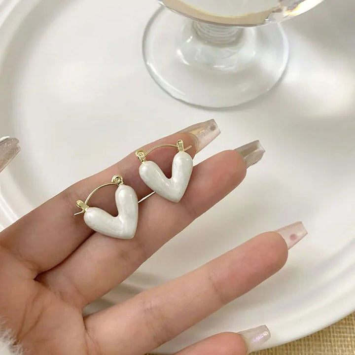 Skanto | Elegante emalje hjerteøreringer