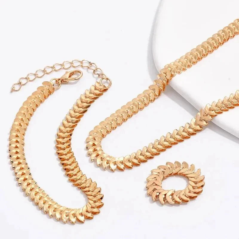 Skanto | Elegant Fiskebone Halskjede, Armbånd og Ring Sett