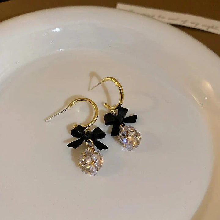 Skanto | Delikat Sløyfe Diamant Drapé Øredobber