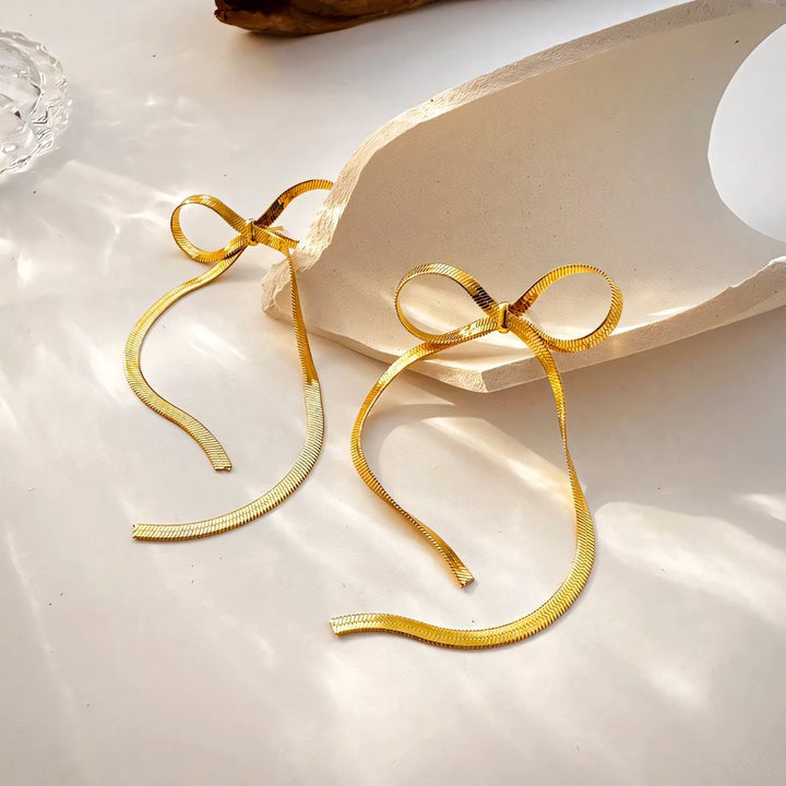 Skanto | Delikat Bue Knappe Øredobber