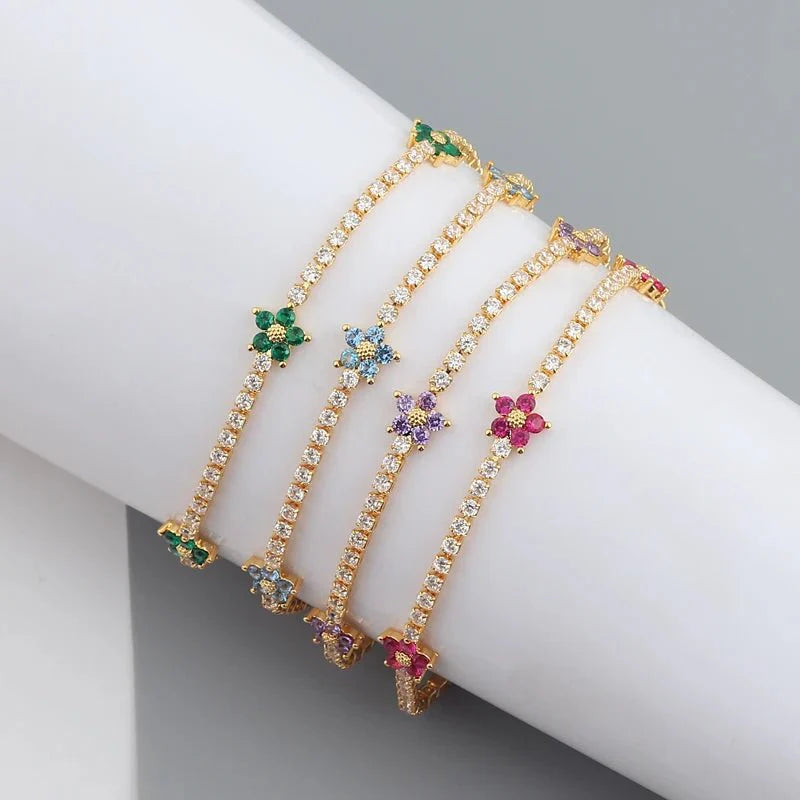 Skanto | Delikate diamantblomster armbånd og øredobber