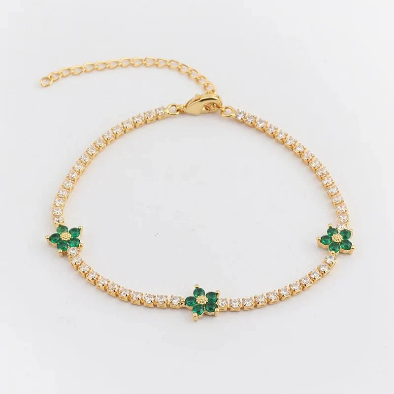 Skanto | Delikate diamantblomster armbånd og øredobber