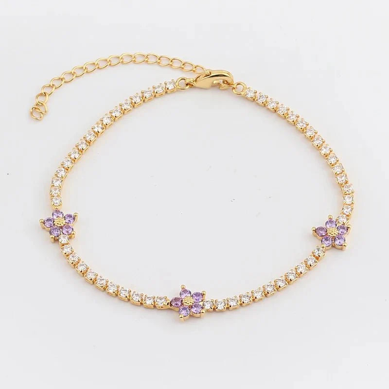Skanto | Delikate diamantblomster armbånd og øredobber