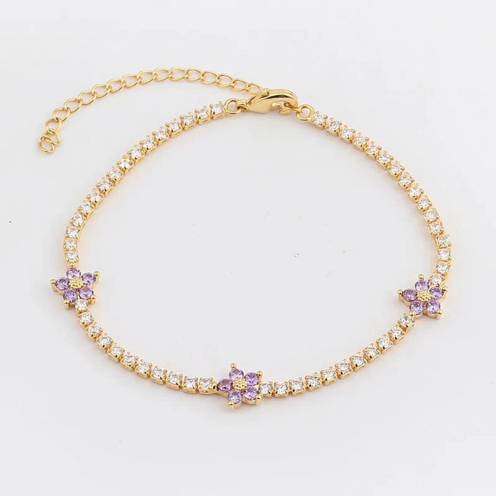 Skanto | Delikate diamantblomster armbånd og øredobber