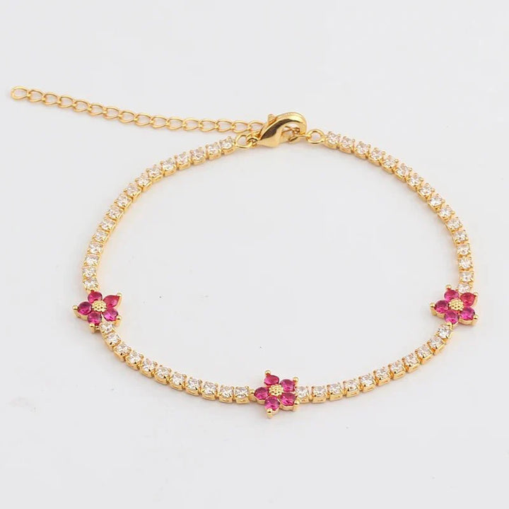 Skanto | Delikate diamantblomster armbånd og øredobber