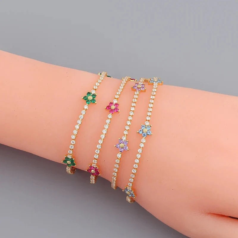 Skanto | Delikate diamantblomster armbånd og øredobber