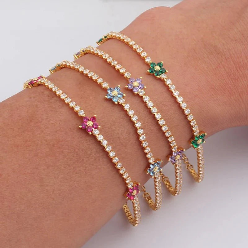 Skanto | Delikate diamantblomster armbånd og øredobber