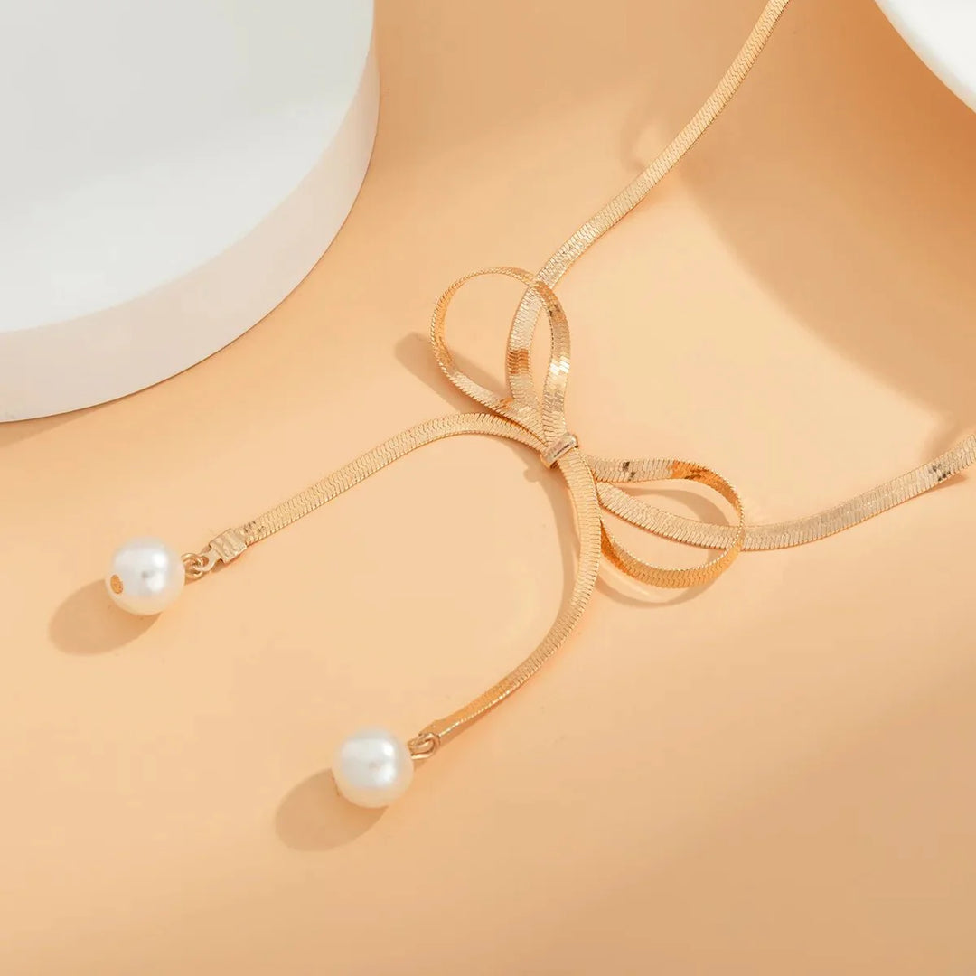 Skanto | Dainty Herringbone Pearl Bow Necklace