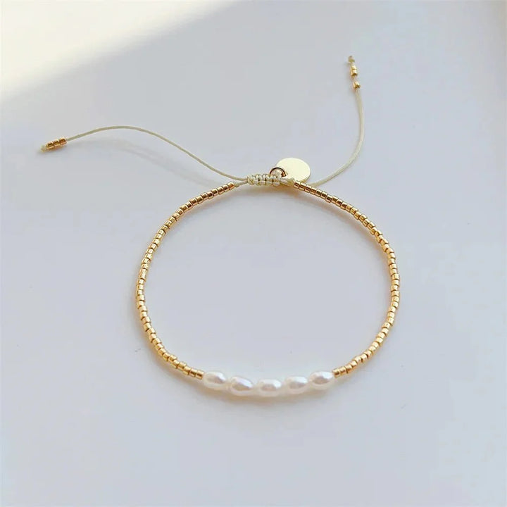 Skanto | Dainty Pearl Gylden Perle Armbånd