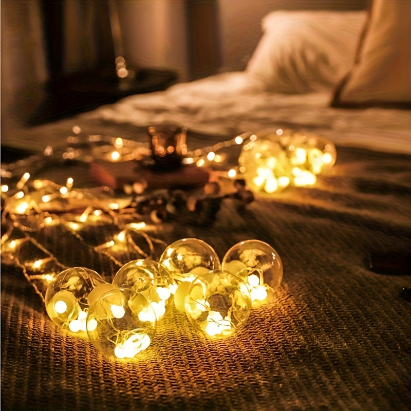 Skanto | Eventyrlys med hengende globusornamenter