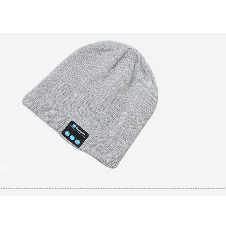 Skanto | Trådløs Bluetooth Smart Hat Caps Høyttaler med Ørepropper og Volumkontroll Mikrofon Varm Vinter