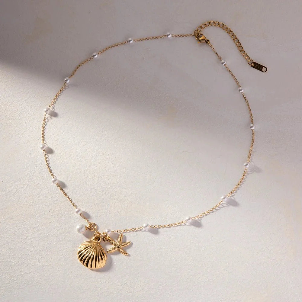 Skanto | Elegante Delikate Spaced Perle Musling Smykke