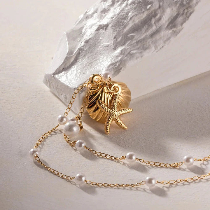 Skanto | Elegante Delikate Spaced Perle Musling Smykke