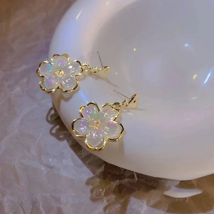 Skanto | Elegant gullaccentuerte blomsterøreringer