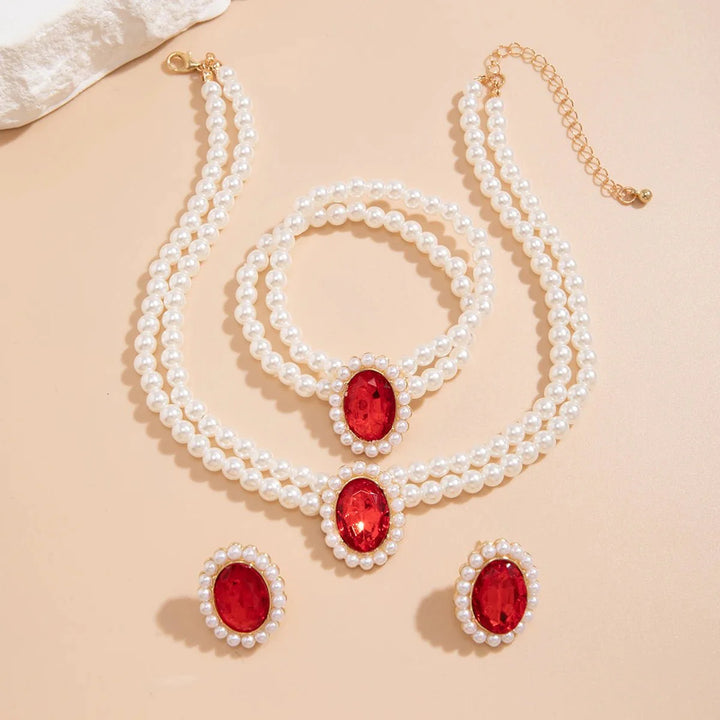 Skanto | Elegant Oval Diamond Pearl Necklace, Bracelet, Earrings Set