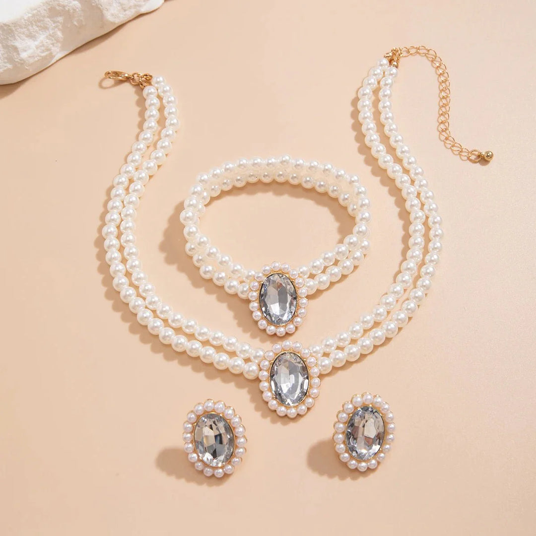 Skanto | Elegant Oval Diamond Pearl Necklace, Bracelet, Earrings Set