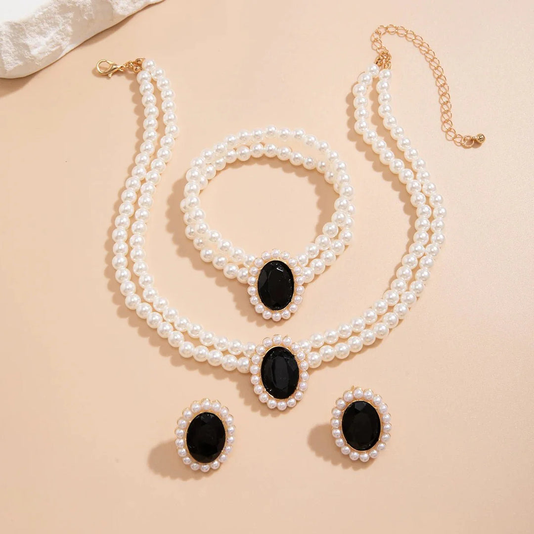 Skanto | Elegant Oval Diamond Pearl Necklace, Bracelet, Earrings Set