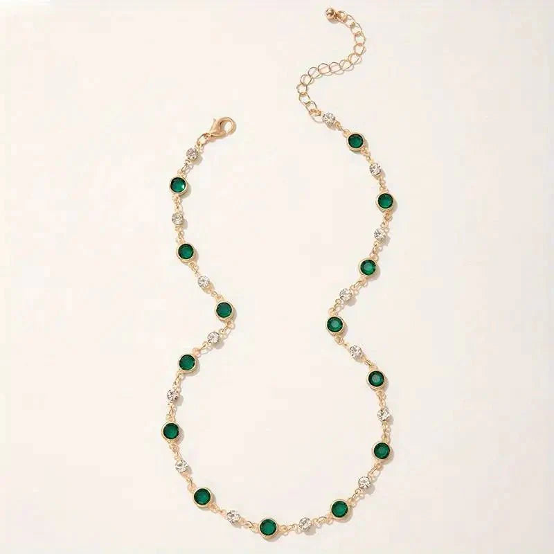 Skanto | Smaragd- og diamant-spaced choker-halskjede