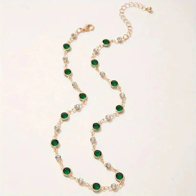 Skanto | Smaragd- og diamant-spaced choker-halskjede