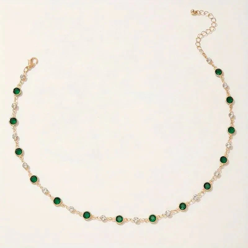 Skanto | Smaragd- og diamant-spaced choker-halskjede