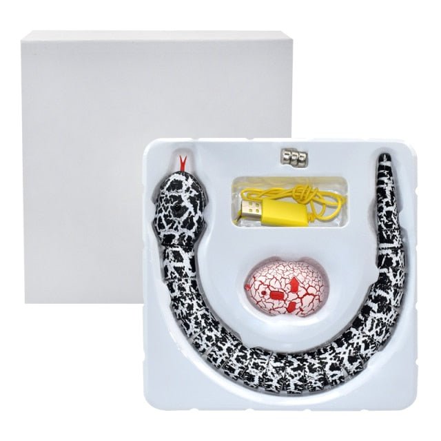 Norvo | SnakeTrick | Morsomme skremme reaksjoner garantert! - Fjernstyrt slange for spøker og spill