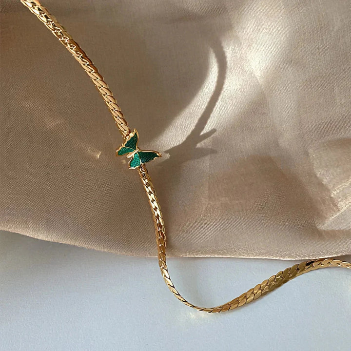 Skanto | Gylden fiskebein sommerfugl choker halskjede