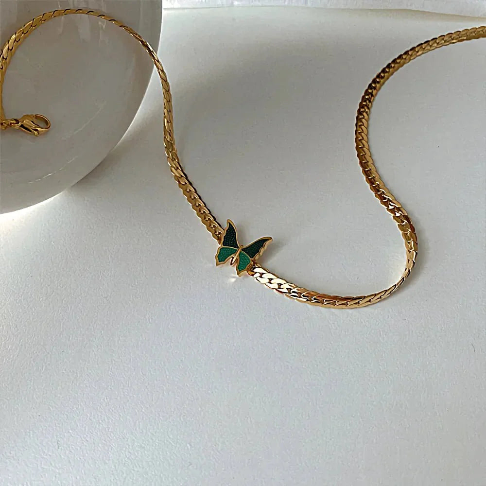 Skanto | Gylden fiskebein sommerfugl choker halskjede