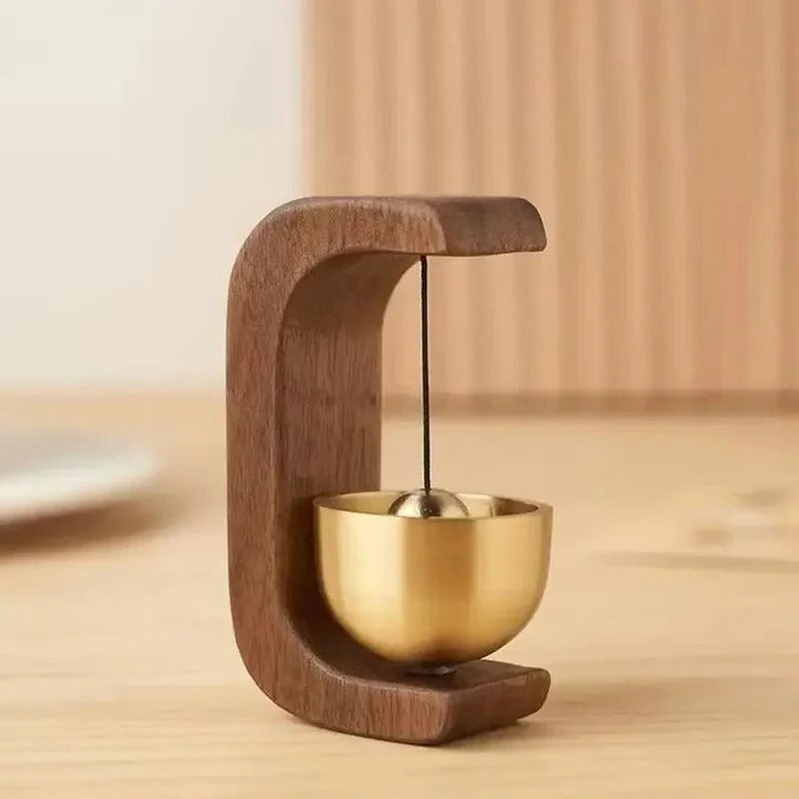 Kabellose Türklingel mit Messingglocke und Holzrahmen