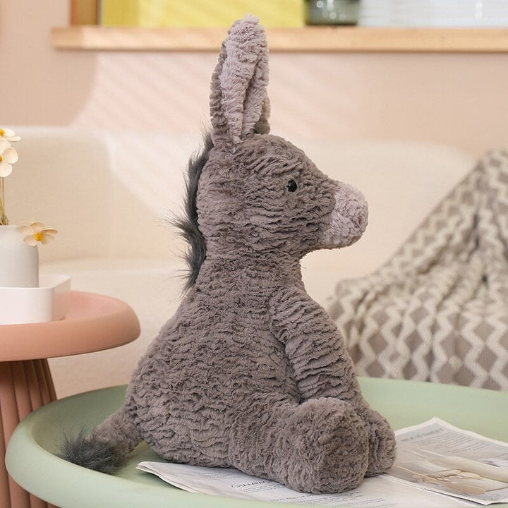 Skanto | Whispy den fluffy esel plush figur