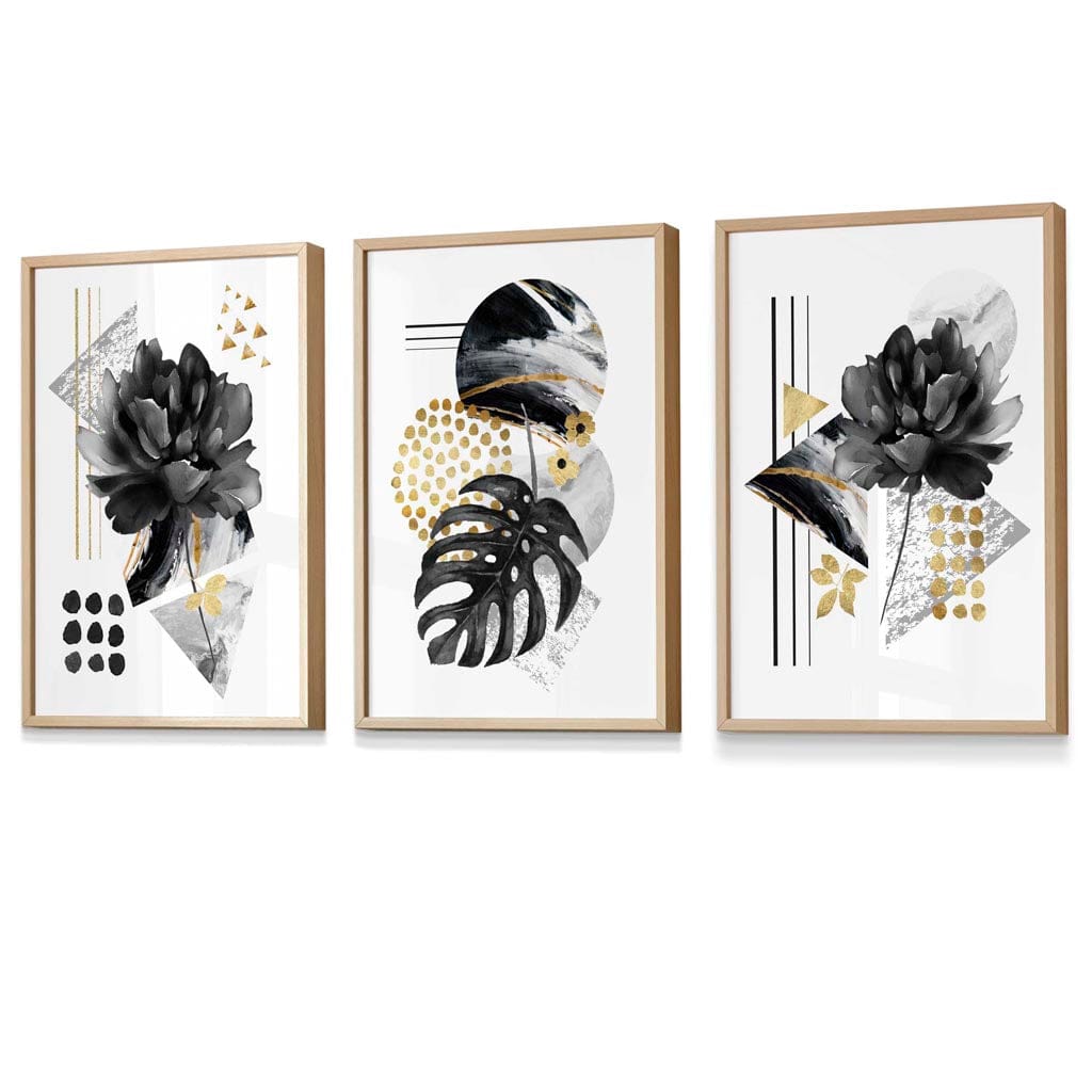 Abstrakte botaniske kunsttrykk i svart og gull / Innrammet