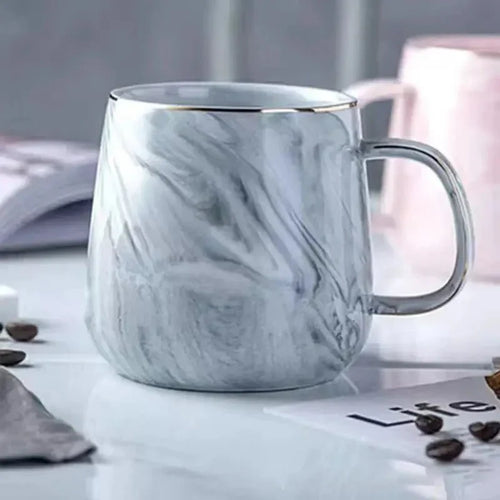 Skanto | Kaffeekopp i keramikk i pastellfarge med marmor mønster