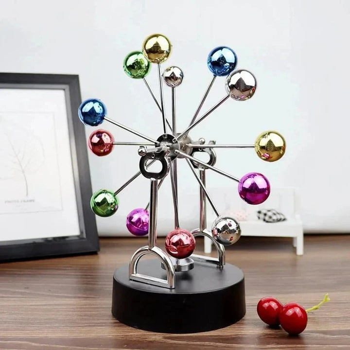 Perpetual Motion Ferris Wheel Desk Ornament in Metal Modern Style | Skanto